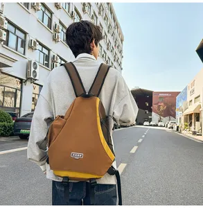 Zaino colorblock in stile urbano, borsa a tracolla unisex alla moda per viaggi all'aperto.