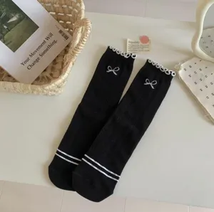 Balletcore cotton mid-calf socks with lace trim, sweet bow embroidery and stripes.