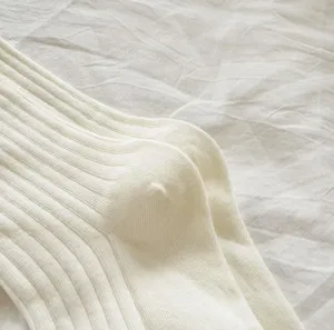 Casual ribbed mid-tube cotton socks for women, comfortable daily wear, soft and breathable.