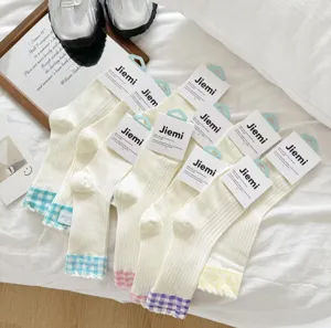 Thin mesh mid-calf socks for women, cute color-block plaid cuffs, breathable cotton spring style.