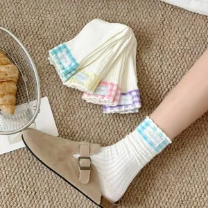 Detailed view of Japanese style mesh crew socks with cute plaid cuffs and soft cotton knit.