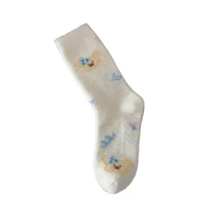 Thickened plush winter cozy fuzzy socks with cute cartoon bear patterns for women daily.