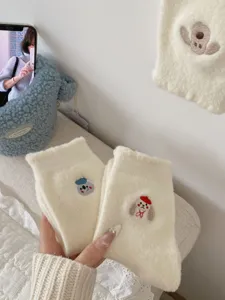 Cozy white plush fleece socks for women, cute cartoon embroidery, thick warm winter floor socks.