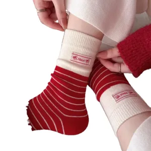 New Year red white striped cashmere socks for women, cute mid tube thermal socks main view