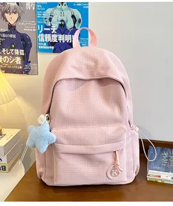 Casual pink student backpack with plush star pendant, lightweight daily school bag