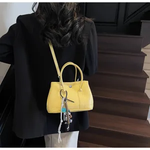 Modische gelbe Damen Tote Bag, elegante Umhaengetasche fuer Alltag und Reisen chic.