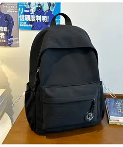 Minimalist black student school bag, casual lightweight daily commuter backpack.