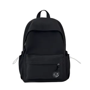 Minimalist black student backpack front pocket detail view daily commute lightweight bag
