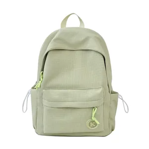 Light green minimalist student backpack for daily commute, lightweight and stylish design.