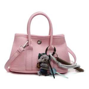 Rosa Leder Tote Tasche für Damen, stilvolle Schulter Umhängetasche mit Anhänger und Schloss.