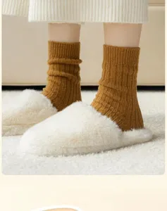 Women's warm wool socks, thick solid color ribbed design for autumn and winter daily wear.