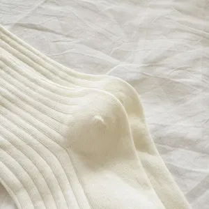 White ribbed mid-tube socks for women, breathable cotton spring and summer fashion.