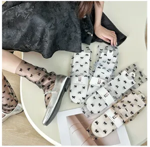 Japanese style black sheer mesh ruffle socks with cute bow embroidery for summer.