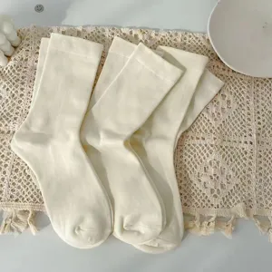 White solid color mid-calf socks for women, soft cotton casual daily wear spring summer.