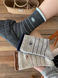 Korean style cotton striped mid-tube socks with cute embroidered egg logo, perfect for daily wear.
