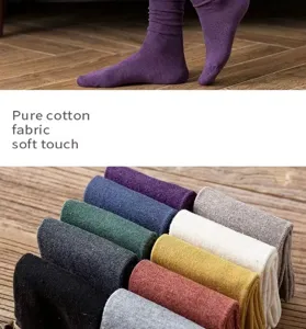 Detailed view of soft pure cotton women crew socks, rolled cuff design, various colors.