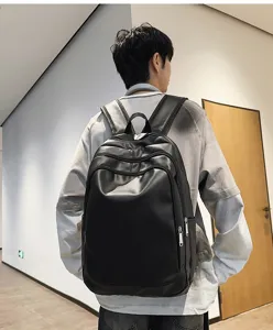 Sac à dos homme en cuir PU noir classique pour travail bureau grande capacité quotidienne.