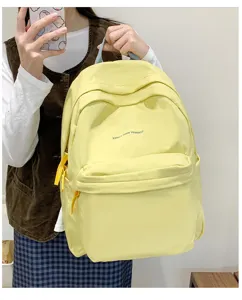 Lässiger gelber Studenten-Schulrucksack mit Buchstabenprint, großes Tagesrucksack.