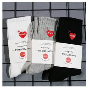 Trendy embroidery crew socks for men and women, comfortable cotton couple casual socks.