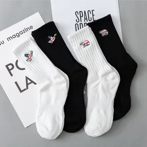 Unisex casual crew socks featuring cute duck embroidery. Comfortable black and white athletic socks.