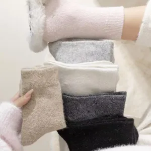 Thickened cashmere wool blend mid-calf socks for autumn and winter home warmth. Soft fuzzy solid colors.