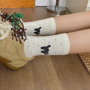 Cute black cat pattern cotton mid-tube socks detail shot, soft fabric, comfortable wear.