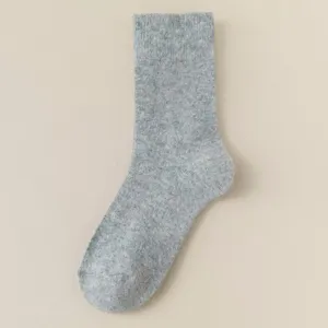 Detailed view of a cozy warm wool blend mid-tube winter sock in soft grey texture.