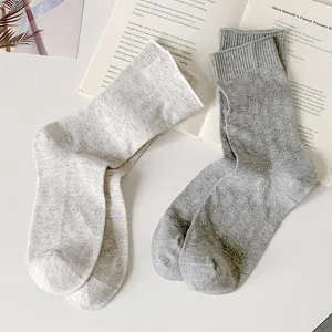 Thin cotton hollow clover mid-tube women socks, breathable mesh style, casual daily wear.