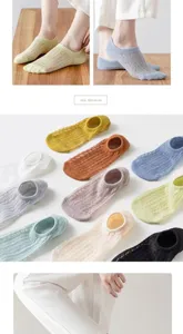 Detail shot of ultra-thin summer mesh boat socks in various colors showing breathable texture.