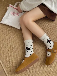 Detail view of cute cartoon cat cotton mid-calf socks for women, featuring soft knit and cozy fit.