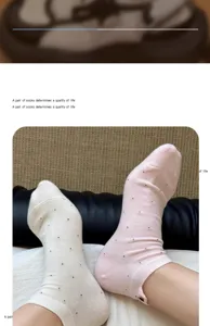 Detail view of cute cotton short socks with sweet dog embroidery for women summer daily wear.