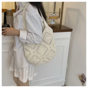 Beige crochet shoulder bag detail, handmade knit pattern, casual aesthetic daily tote.