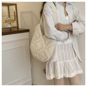 Detail view of Japanese vintage style crochet woven tote shoulder bag for women beach use.