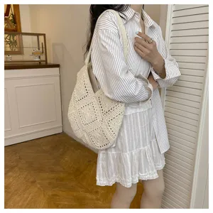 Detail shot of a Japanese minimalist crochet knit shoulder bag, perfect for casual commute.