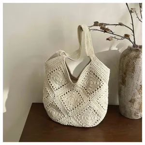 Minimalist crochet shoulder bag with hollow-out pattern, ideal for casual daily commuting use.