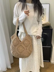 Chic casual woven tote bag for women, handmade crochet beach shoulder bag for daily commuting.