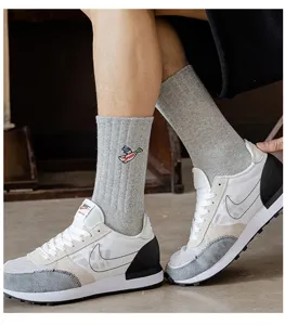 Grey ribbed crew socks with cute duck embroidery, comfortable cotton blend streetwear style.