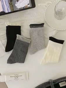 Casual solid color rolled cuff crew socks for women, soft comfortable daily wear cotton socks.