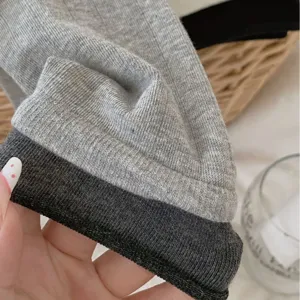 Women's knit mid-tube socks, solid color rolled edge design, comfortable autumn winter socks.