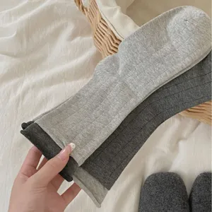 Cozy cotton ribbed mid-calf socks in light and dark gray, perfect for daily wear.
