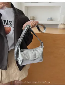 Chic silver metallic shoulder bag vintage fashion women trendy underarm handbag.