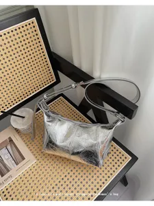 Metallic silver underarm shoulder bag, trendy vintage style chic handbag for women daily wear.