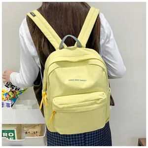 Großer Segeltuch Schulrucksack mit stilvollem Buchstabenprint für Studenten und den Alltag.
