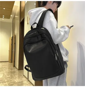 Sac a dos homme en cuir PU noir, grande capacite, parfait pour les trajets quotidiens.