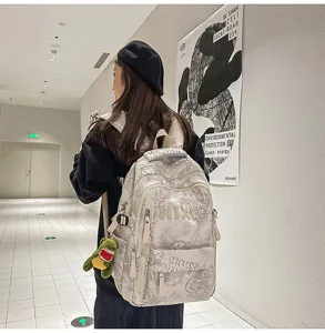 Casual nylon campus large capacity backpack with letters and cute pendant for daily school use.