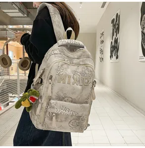 Casual nylon school backpack with large capacity and stylish graffiti letter print for daily use.