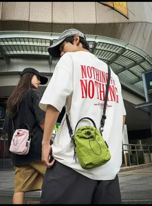 Casual minimalist drawstring bucket bag for women, candy color lightweight crossbody shoulder bag.