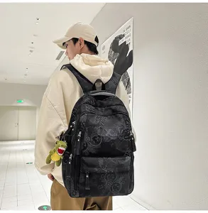 Minimalist nylon letter backpack with large capacity for campus style and daily school use.