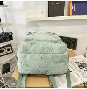 Green nylon casual school backpack with print pattern, large capacity for daily campus use.