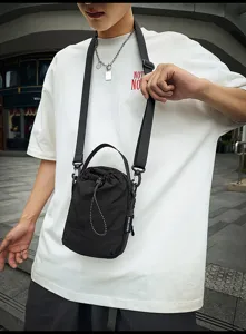 Casual nylon drawstring bucket bag for women, simple fashion crossbody shoulder bag.